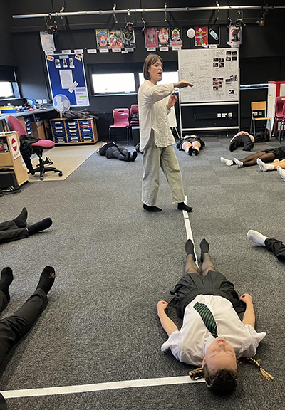 actress Josephine Rogers in the drama department with students