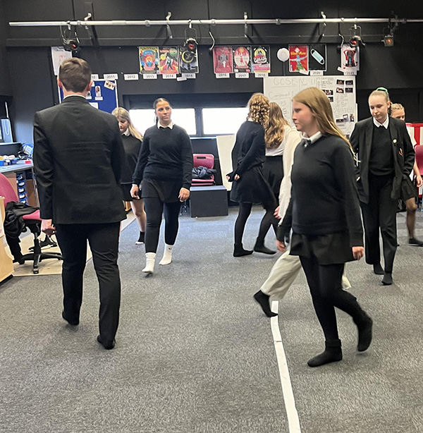 actress Josephine Rogers in the drama department with students